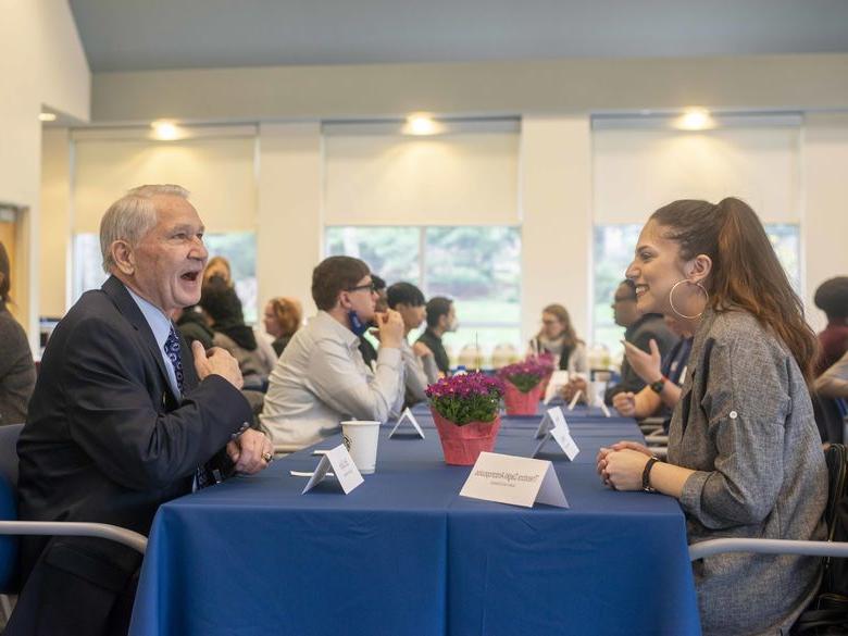 Donor event with two people talking